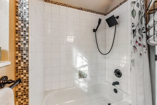 bathroom with shower / bathtub combination with curtain