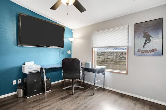 home office with ceiling fan, lofted ceiling, and dark wood-type flooring