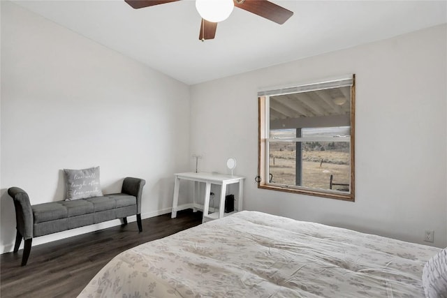 bedroom featuring dark hardwood / wood-style floors and ceiling fan