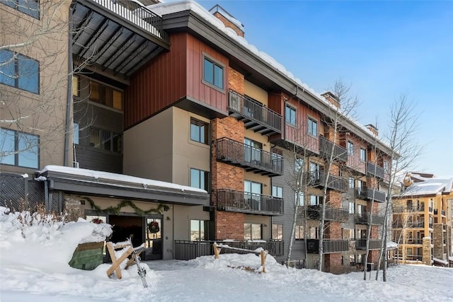 view of snow covered building