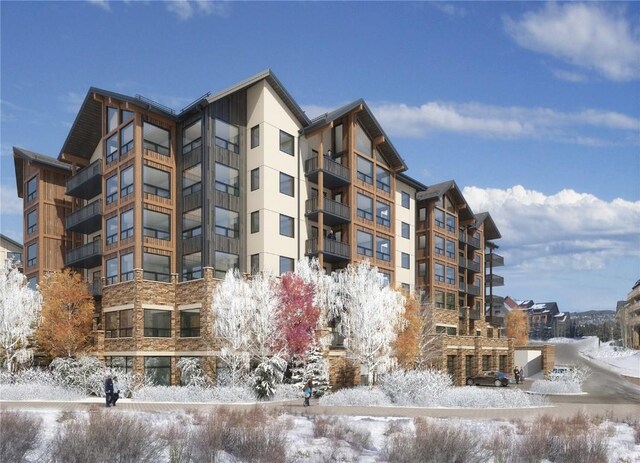 view of snow covered property