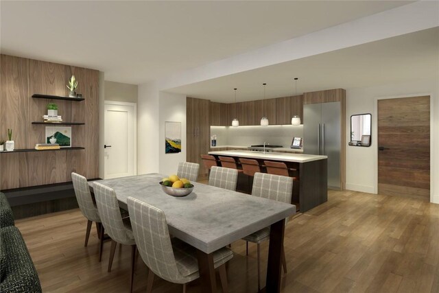 dining room with wood-type flooring