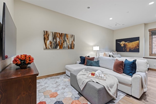 living room with light hardwood / wood-style flooring