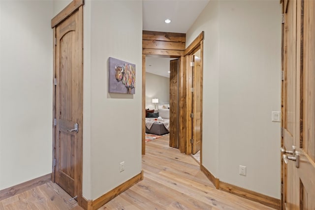 corridor featuring light wood-type flooring