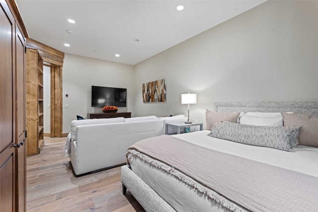 bedroom with light hardwood / wood-style floors