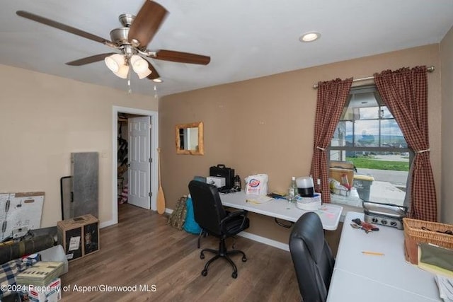 office area with ceiling fan and hardwood / wood-style flooring