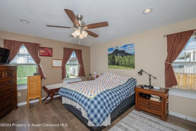 bedroom featuring ceiling fan and wood-type flooring