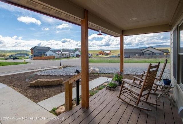 wooden terrace with covered porch