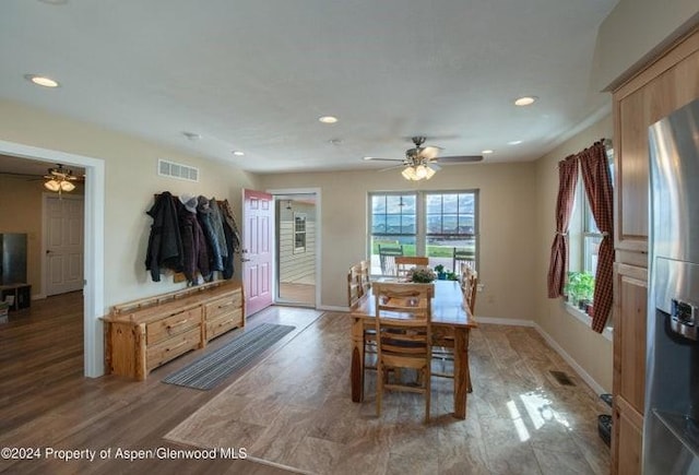 dining area featuring ceiling fan and hardwood / wood-style flooring