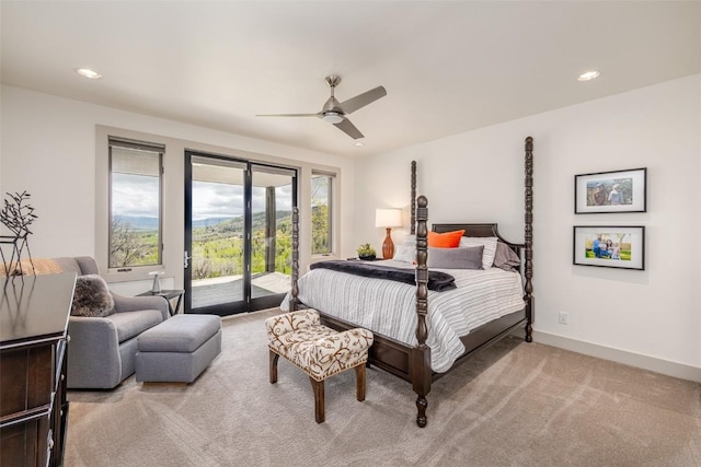 carpeted bedroom featuring access to outside and ceiling fan