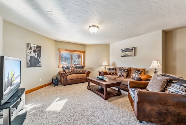 carpeted living area featuring baseboards