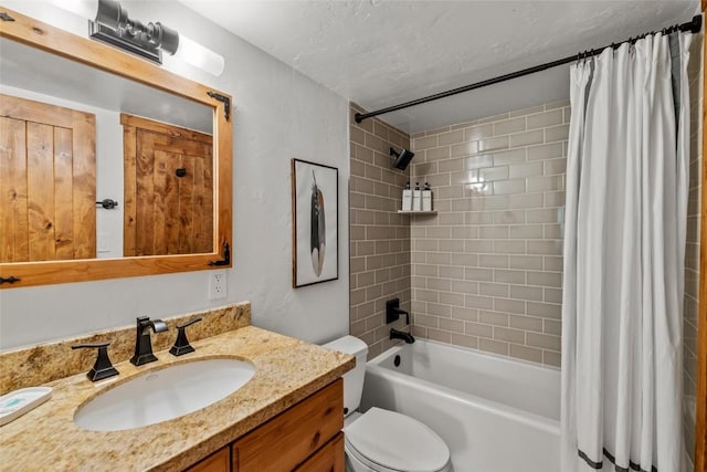 full bathroom featuring vanity, toilet, a textured ceiling, and shower / bath combo with shower curtain