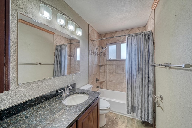 full bathroom featuring vanity, shower / bathtub combination with curtain, a textured ceiling, and toilet