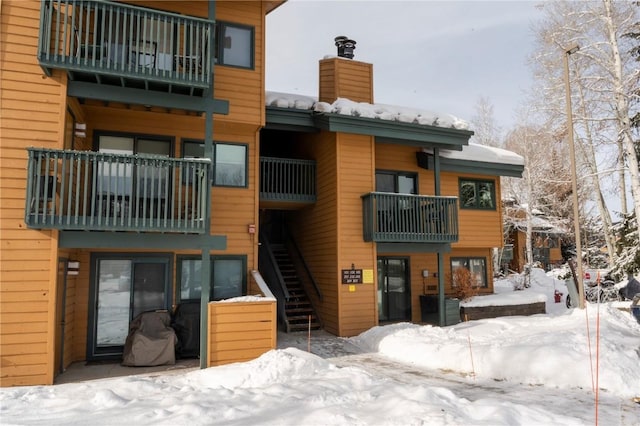 view of snow covered property