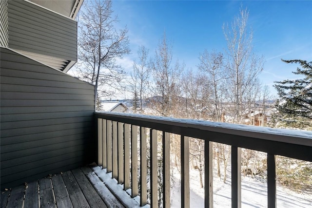 view of snow covered deck