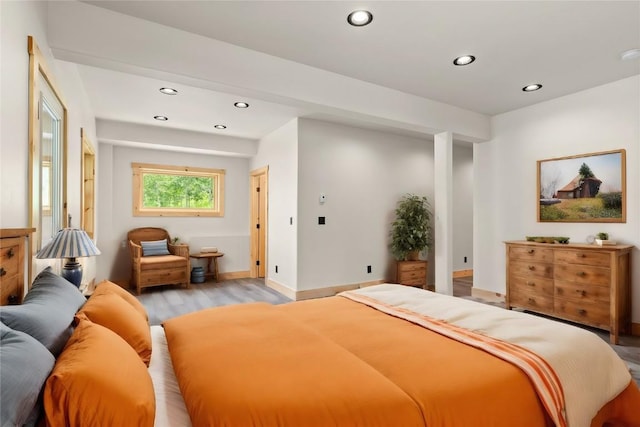 bedroom with light wood-type flooring