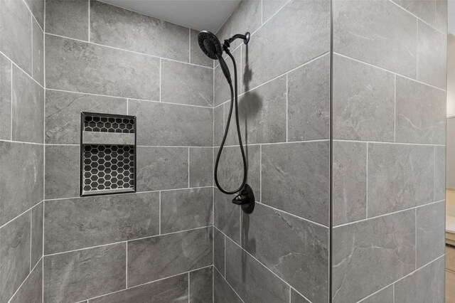 details featuring a tile shower