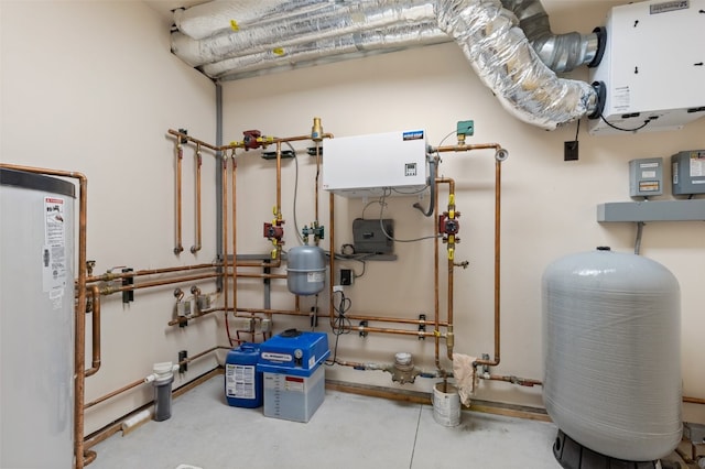 utility room featuring gas water heater