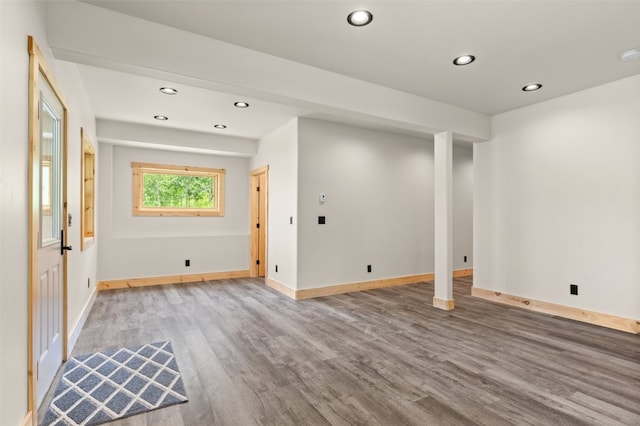 unfurnished room featuring wood-type flooring