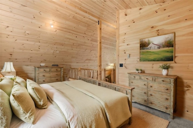 bedroom with light colored carpet, wooden ceiling, and lofted ceiling