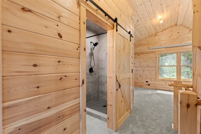 bathroom with wood walls, wooden ceiling, tiled shower, and vaulted ceiling