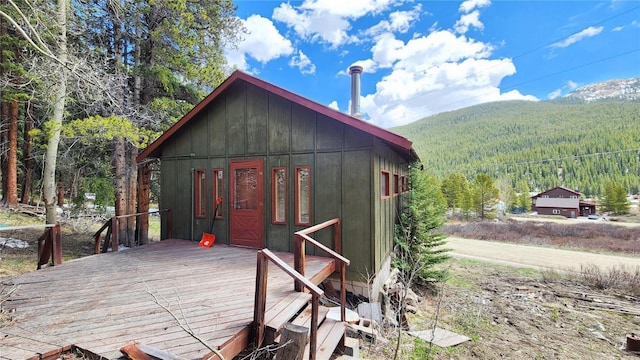 view of outbuilding featuring a mountain view