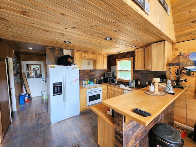 kitchen with dark hardwood / wood-style flooring, white appliances, light brown cabinetry, and wooden ceiling