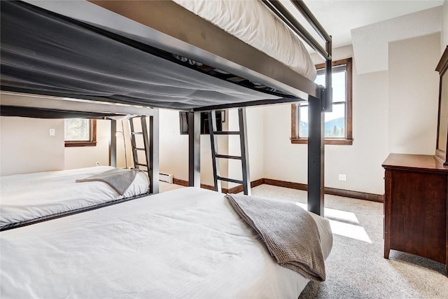 unfurnished bedroom featuring light colored carpet and multiple windows