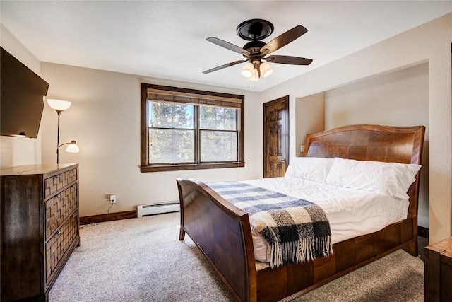 bedroom with a baseboard radiator, ceiling fan, and light colored carpet