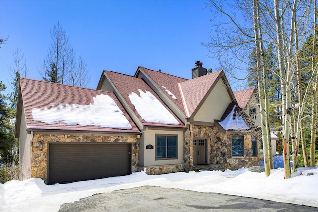 view of front of home with a garage