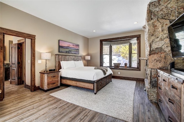 bedroom featuring hardwood / wood-style flooring