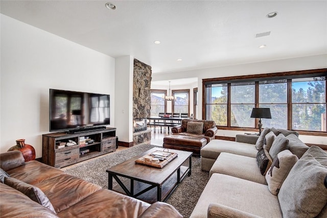 living room featuring an inviting chandelier