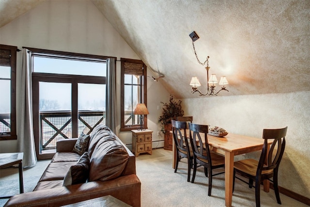 dining space with lofted ceiling, baseboard heating, a notable chandelier, and light colored carpet