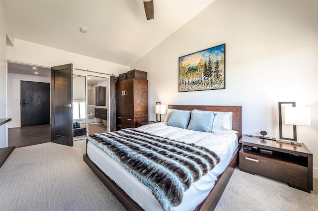 bedroom featuring ceiling fan and lofted ceiling