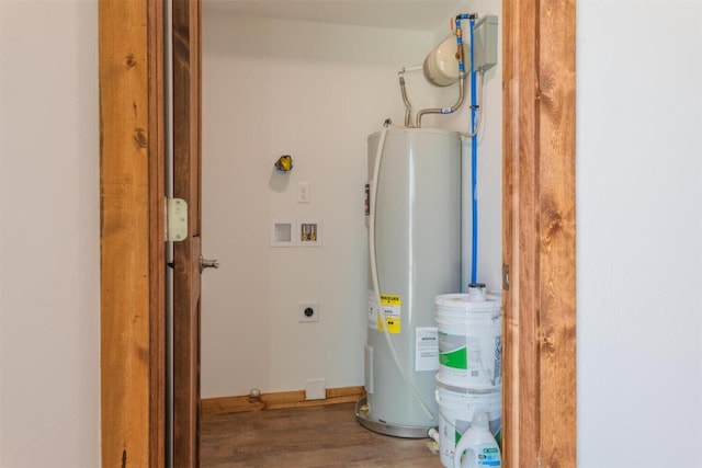 utility room with electric water heater