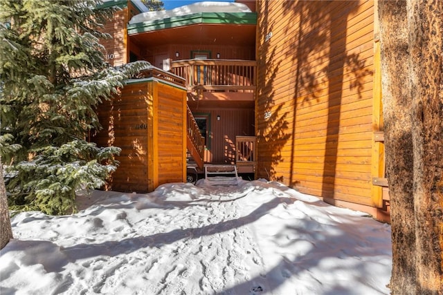 view of snow covered patio