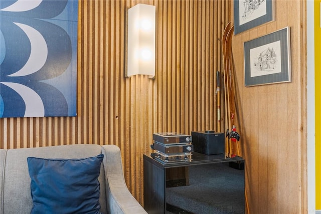 sitting room with wood walls