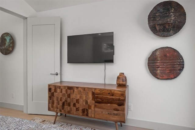 interior details featuring hardwood / wood-style floors