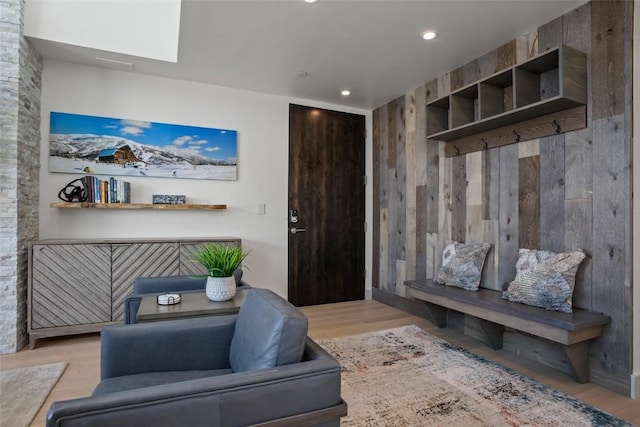 sitting room featuring light hardwood / wood-style flooring