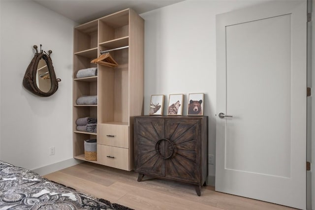 bedroom featuring light wood-type flooring