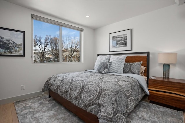 bedroom with wood-type flooring