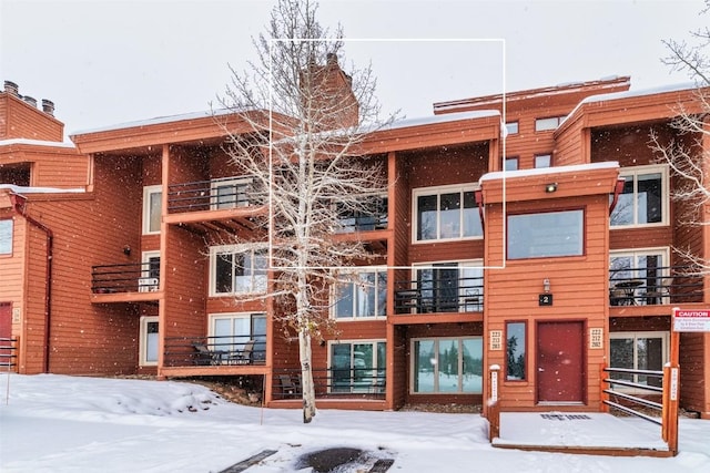 view of snow covered building