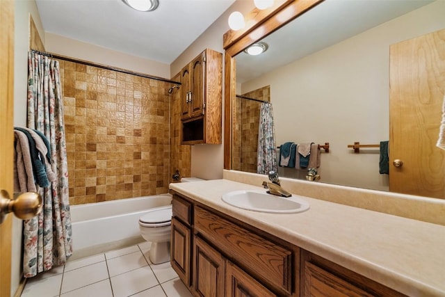 full bathroom featuring tile patterned flooring, shower / bath combo, toilet, and vanity