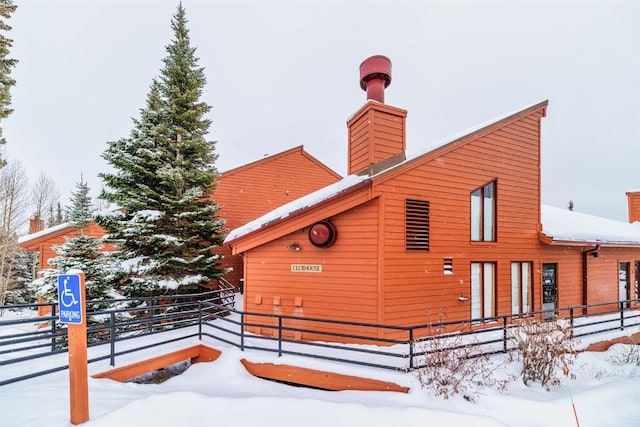 view of snow covered property