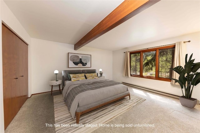 carpeted bedroom featuring beamed ceiling, a baseboard heating unit, and a closet