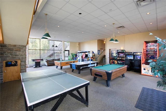 playroom featuring a paneled ceiling, carpet, floor to ceiling windows, and billiards