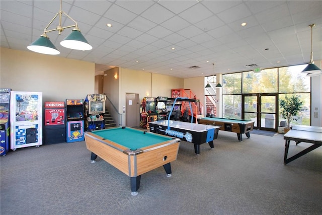 game room with carpet flooring, a drop ceiling, floor to ceiling windows, and billiards