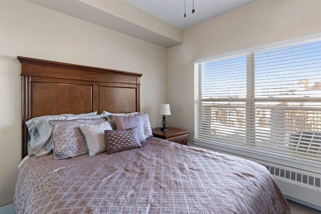 bedroom with radiator heating unit