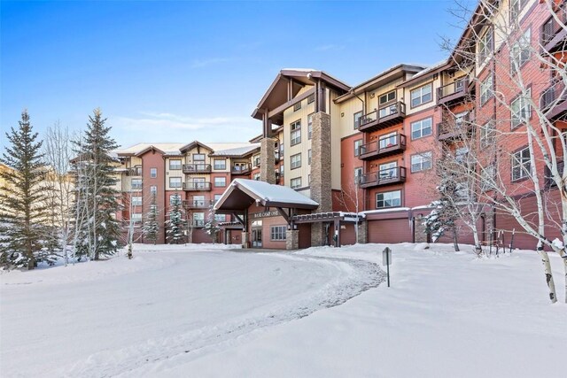 view of snow covered building