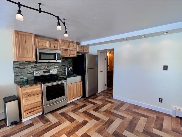 kitchen with stainless steel appliances, sink, light brown cabinets, dark parquet floors, and tasteful backsplash